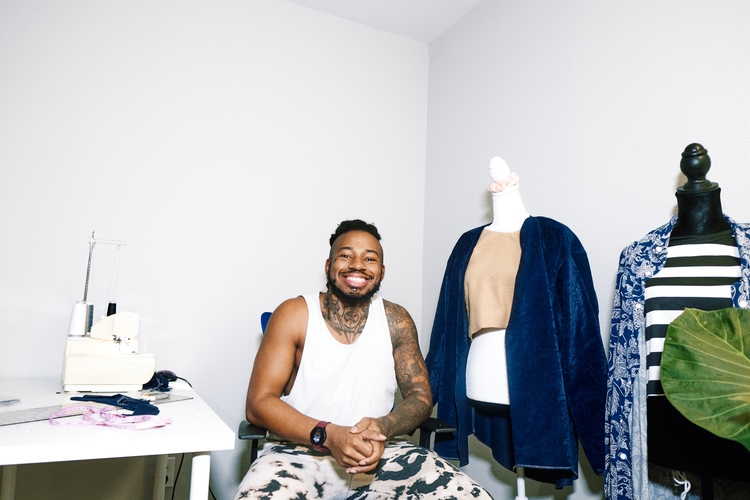 Man with sewing machine